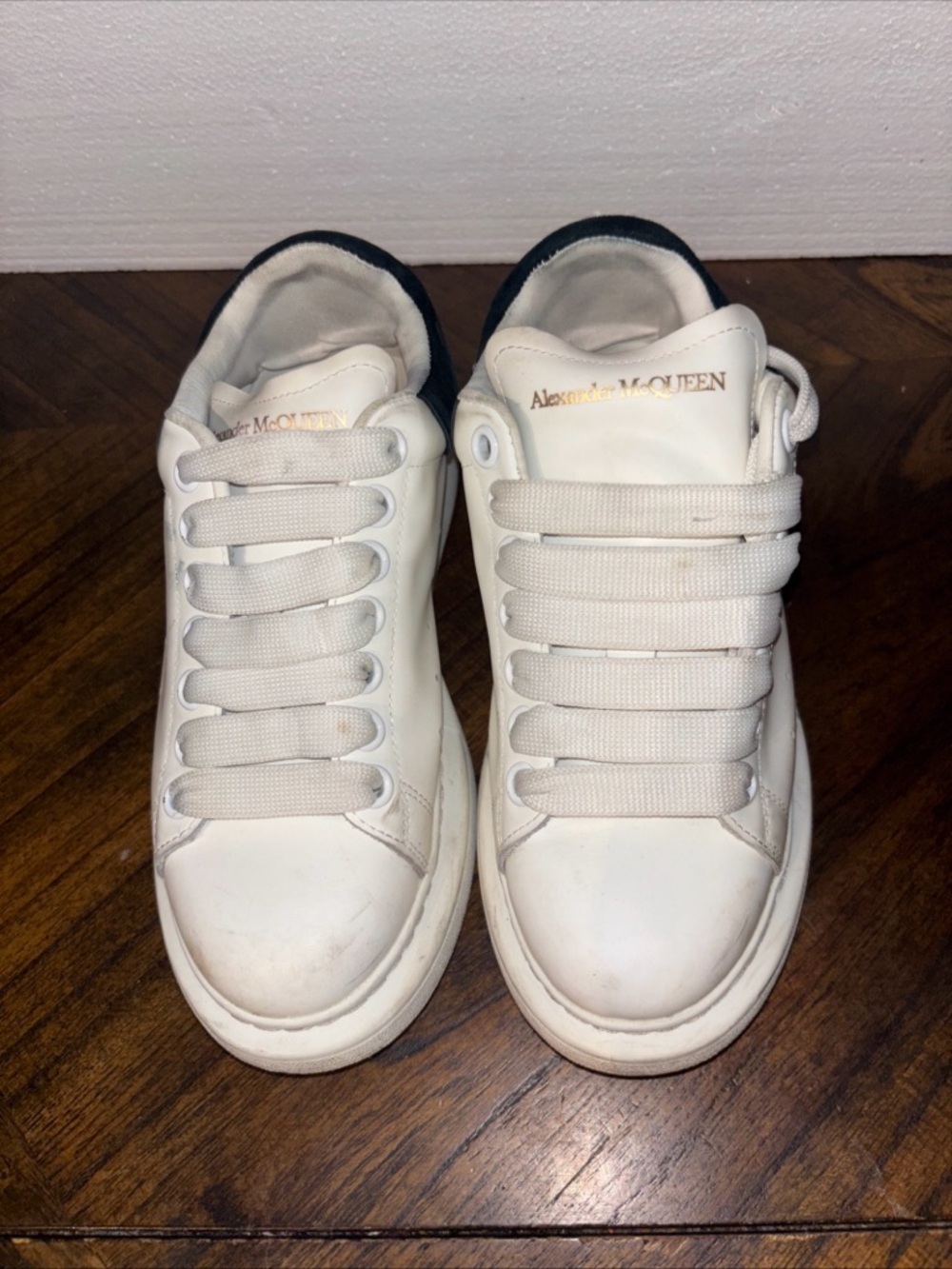 Alexander McQueen White Leather Sneakers with Gold Logo
